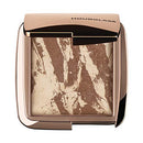 Hourglass Ambient Lighting Bronzer in Diffused Bronze Light. Highlighting Bronzer for a Natural Sun-Kissed Glow. Vegan and Cruelty-Free. HOURGLASS
