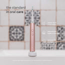 AquaSonic Vibe Series Ultra Whitening Toothbrush – ADA Accepted Electric Toothbrush - 8 Brush Heads & Travel Case - Ultra Sonic Motor & Wireless Charging - 4 Modes w Smart Timer – Satin Rose Gold Aquasonic