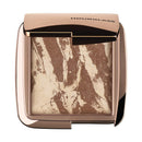 Hourglass Ambient Lighting Bronzer in Diffused Bronze Light. Highlighting Bronzer for a Natural Sun-Kissed Glow. Vegan and Cruelty-Free. HOURGLASS