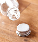 1 oz Clear Glass Boston Round Bottles with Silver Metal Screw On Caps (12 Pack) + Funnel JUVITUS