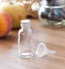 1 oz Clear Glass Boston Round Bottles with Silver Metal Screw On Caps (12 Pack) + Funnel JUVITUS