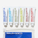 MALIN+GOETZ Best-Sellers Travel Kit | Six Everyday Essentials for Face, Body + Hair | Grapefruit Face Cleanser, Vitamin E Face Moisturizer, Peppermint Shampoo + More | Vegan, Travel-Friendly(6 x 1 oz) Infinity Warehouse