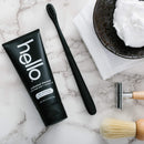 Hello Activated Charcoal Epic Teeth Whitening Fluoride Toothpaste and Toothbrush, Fresh Mint and Coconut Oil, Vegan, SLS Free, Gluten Free and Peroxide Free, 4 Ounce (Pack of 2) hello